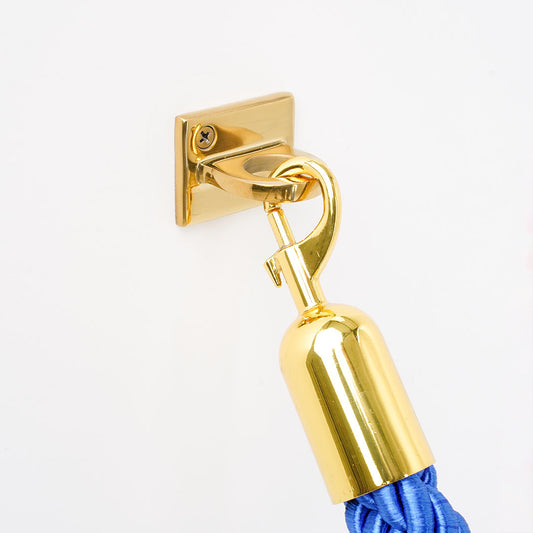 enganche de pared dorado para cordones