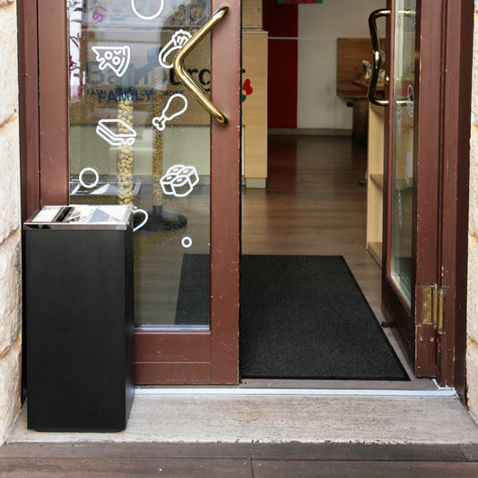 papelera negra con cenicero