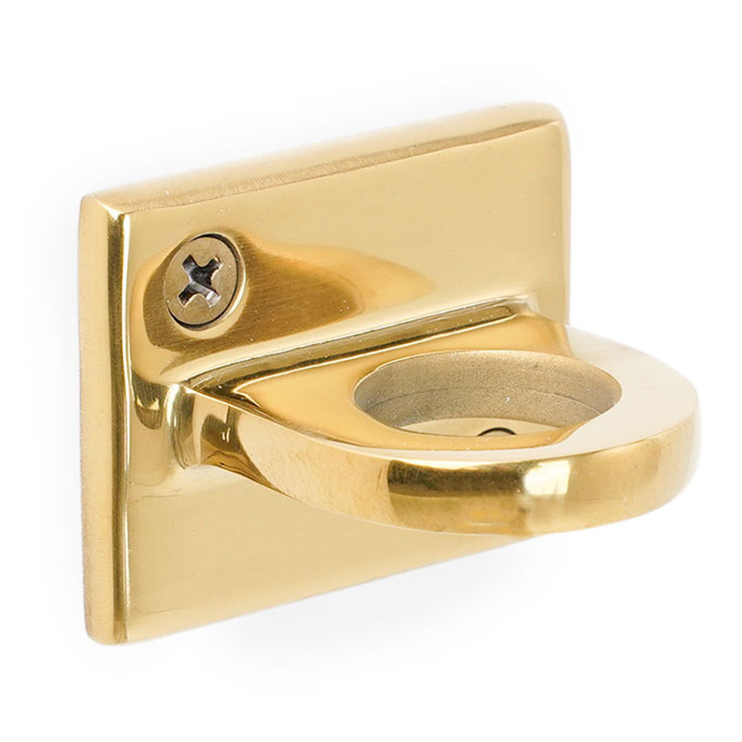 enganche de pared dorado para cordones