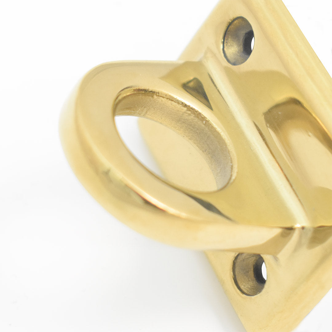 enganche de pared dorado para cordones