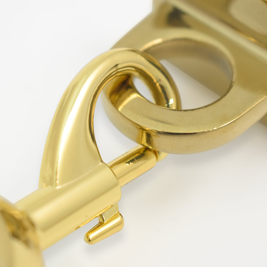 enganche de pared dorado para cordones