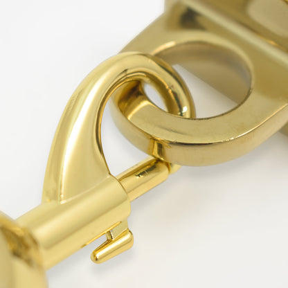 enganche de pared dorado para cordones