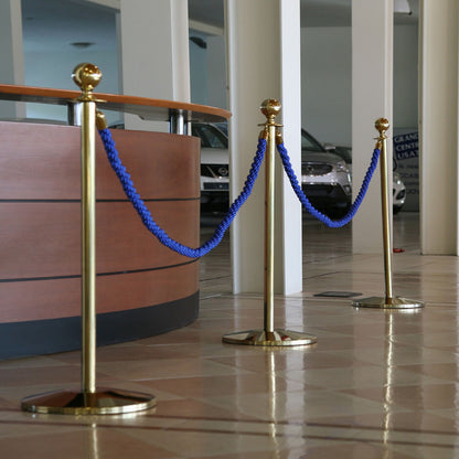 poste dorado con cordón azul