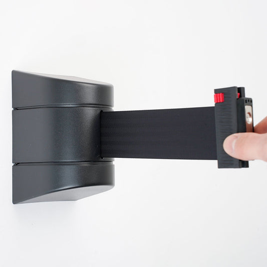 cinta rectrátil de pared