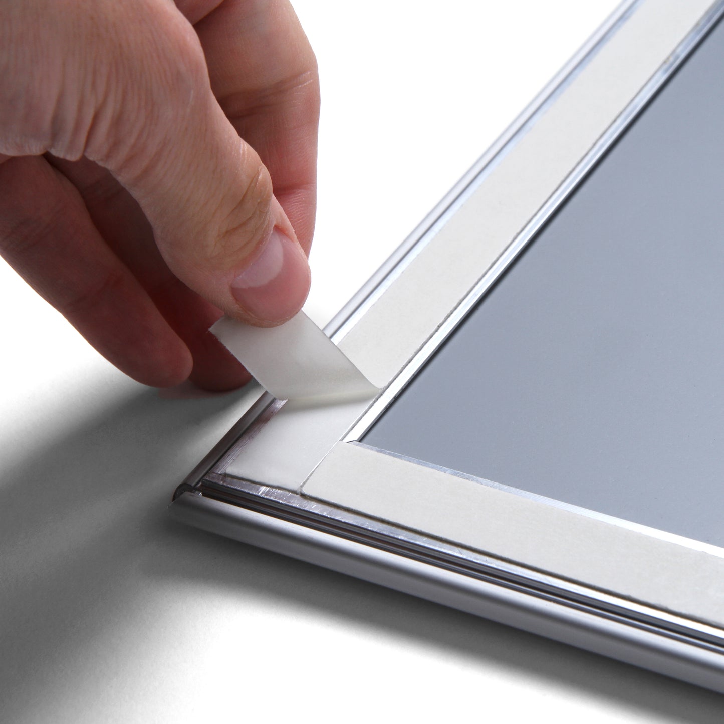 marcos publicitario con adhesivo para escaparate